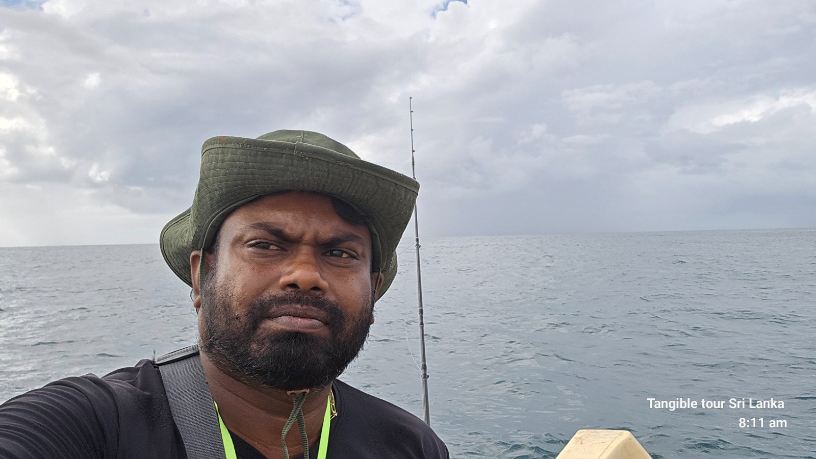 Local skipper steering the outrigger offshore